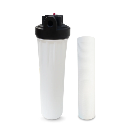 The Boiler Water Treatment Filter System with Sediment Anti-Scale Filter Cartridge (40 GPM) by Premiere Sales, featuring a white filter housing with a black cap, is placed next to its accompanying anti-scale cartridge specifically designed for boilers.