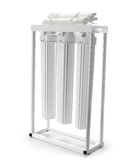 A freestanding white frame from Premiere Sales supports three vertically-aligned cylindrical filter units, characteristic of the 200 GPD Light Commercial RO System Floor Standing Reverse Osmosis.